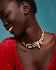 Krista Gold Bow Statement Necklace in White Mix
