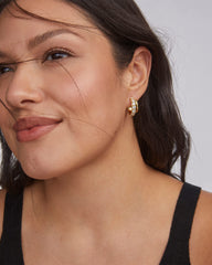 Livy Gold Huggie Earrings in White Crystal