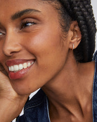 Mila 14k Yellow Gold Huggie Earrings in White Diamond