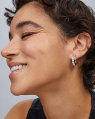 Livy Silver Huggie Earrings in White Crystal